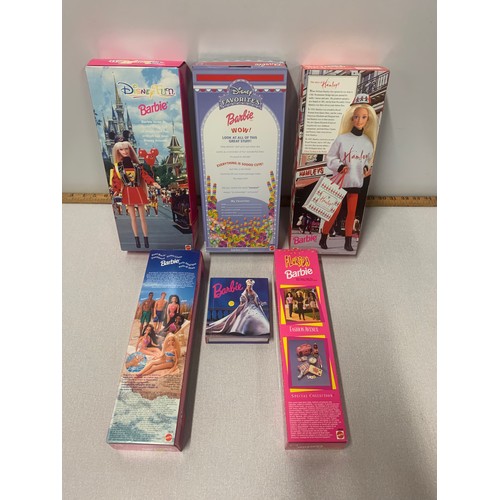 46 - 5 x boxed Barbie dolls and Barbie book.