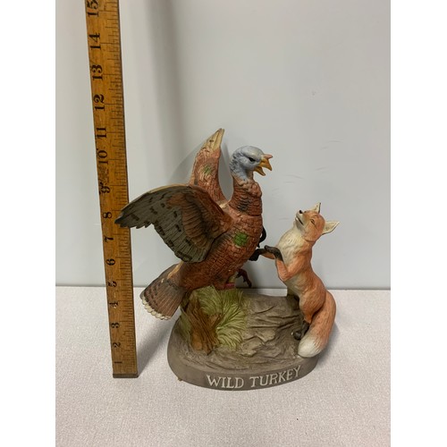 48 - Vintage Austin Nichols and Co. Wild Turkey and Red Fox porcelain decanter. (Full) Damage to Turkey.