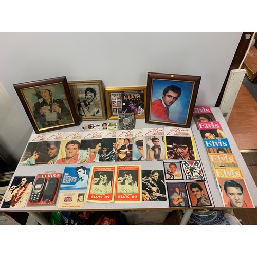 81 - Collection of Elvis memorabilia to include fan club magazines, commemorative coin and framed picture... 