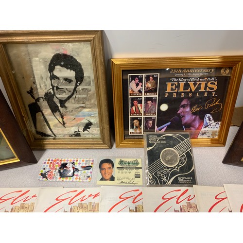 81 - Collection of Elvis memorabilia to include fan club magazines, commemorative coin and framed picture... 