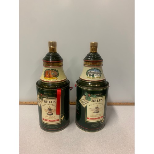 127 - 2 x Bells whisky decanters - Christmas 1989 and 1991 full and sealed with tins.