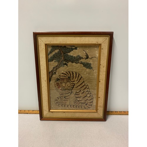 187 - Late 19th century Korean Minhwa tiger and magpie painting of silk in frame.