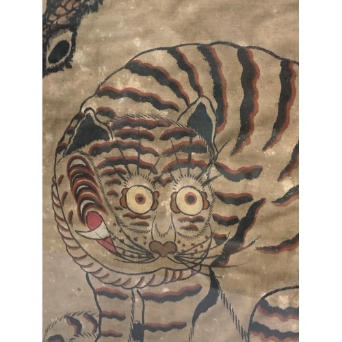 187 - Late 19th century Korean Minhwa tiger and magpie painting of silk in frame.