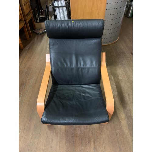 27 - Ikea Poang leather armchair.