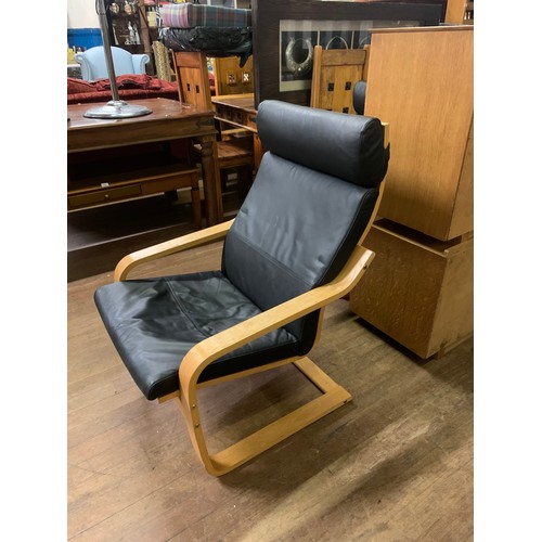 28 - Ikea Poang leather armchair.