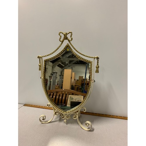 42 - Metal framed shield vanity mirror.
Approx 60cm x 40cm