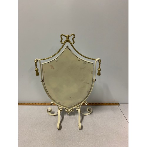 42 - Metal framed shield vanity mirror.
Approx 60cm x 40cm