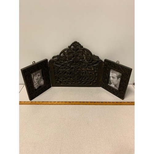 9 - Carved wooden photo frame with ornate floral design.
81cm x 38cm