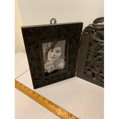 9 - Carved wooden photo frame with ornate floral design.
81cm x 38cm