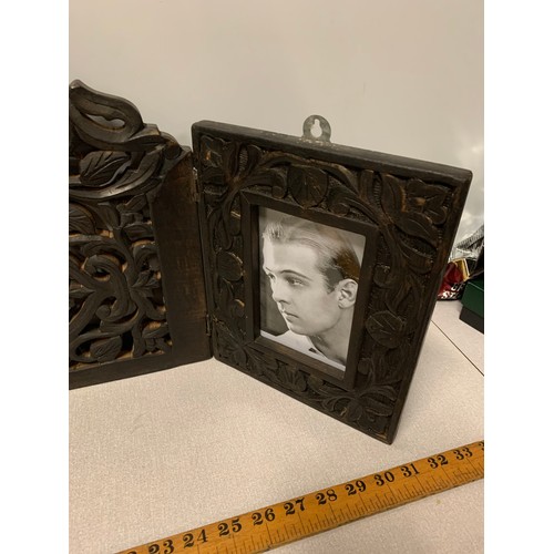 9 - Carved wooden photo frame with ornate floral design.
81cm x 38cm