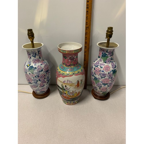 12 - Pair of Oriental lamps on wooden stands along with hand painted Oriental vase. Vase marked to base.
... 