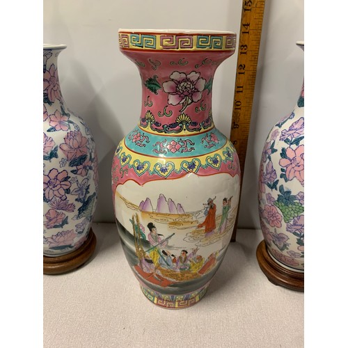 12 - Pair of Oriental lamps on wooden stands along with hand painted Oriental vase. Vase marked to base.
... 