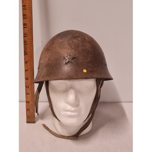 52 - 1932 Japanese steel army helmet.