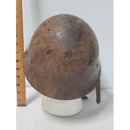 52 - 1932 Japanese steel army helmet.