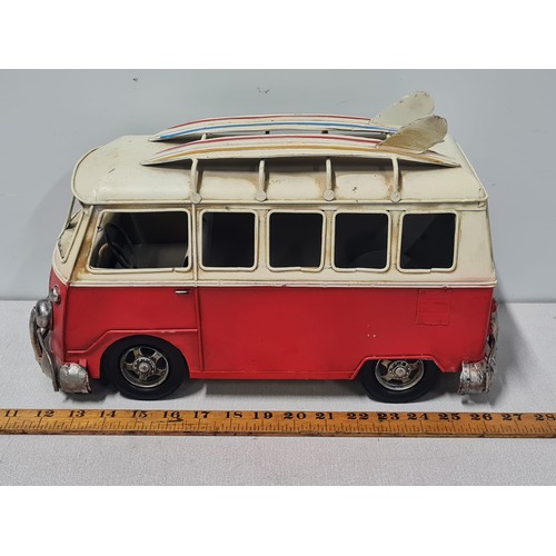 53 - Large metal model van with surfboards on roof.
Approx 40cm Long