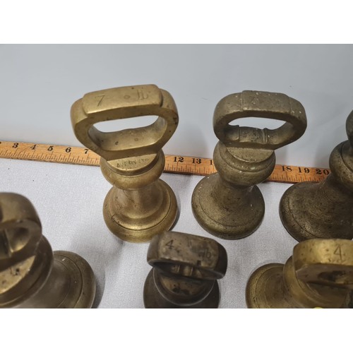 75 - Collection of large vintage bell weights.