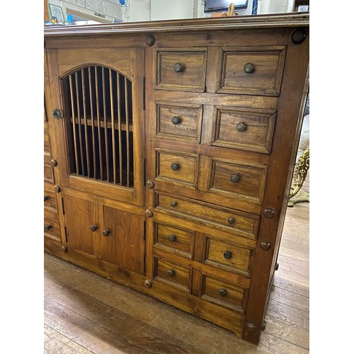 104 - Large solid wood multi drawer apothecary style dresser.
122cm l x 42cm d x 88cm h