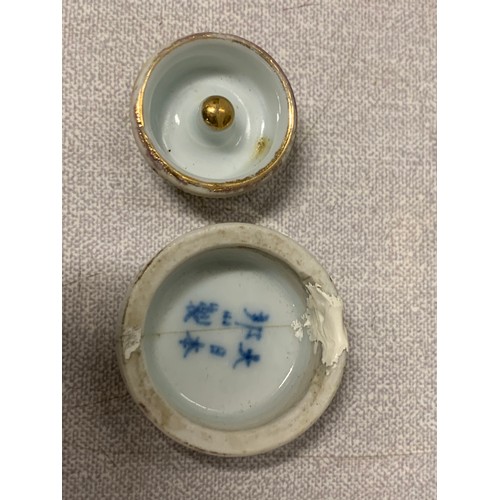 190 - Vintage hand painted Chinese porcelain scent bottle. Markings on inside of lid. Lid has had repair. ... 