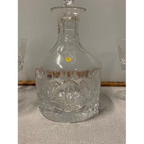 205 - Edinburgh crystal decanter with 4 matching sherry glasses.