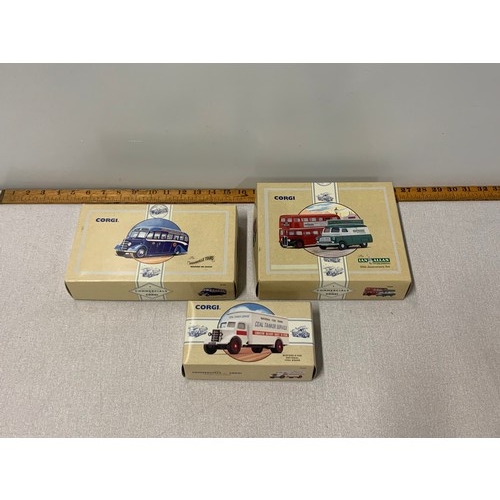 313 - 3 boxed Corgi Model buses and vans.