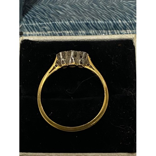 340 - 18ct gold and platinum ring encrusted with 3 diamond chips.