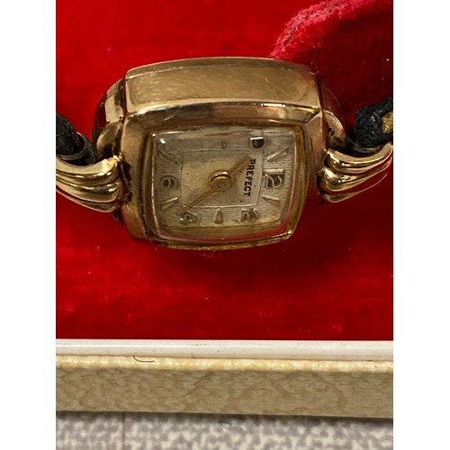 343 - 9ct gold faced ladies Prefect watch with leather straps.