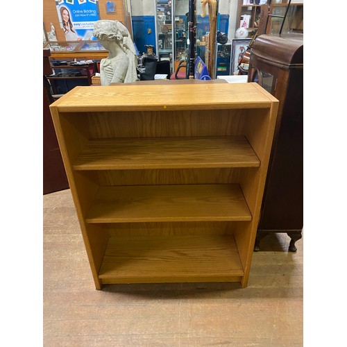 353 - Solid oak bookcase. 103cm x 83cm x 32cm.