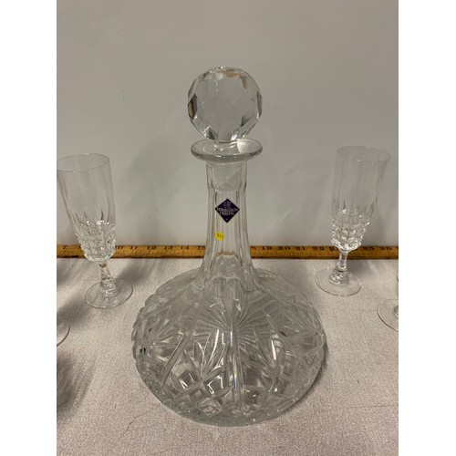 25 - Edinburgh crystal ships decanter along with 6 crystal whisky glasses and 6 crystal champagne flutes.