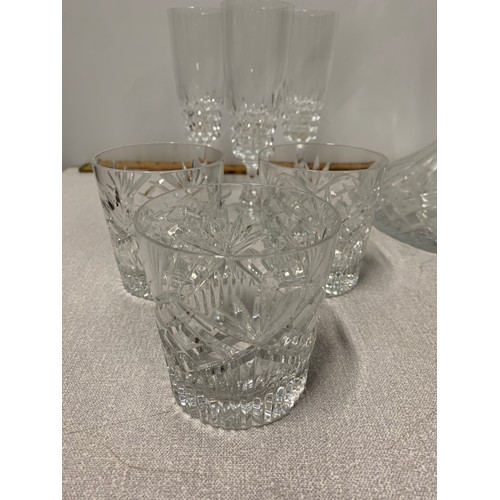 25 - Edinburgh crystal ships decanter along with 6 crystal whisky glasses and 6 crystal champagne flutes.