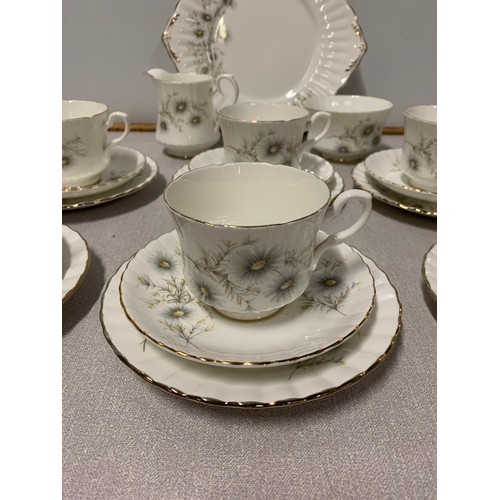 29 - 21 piece Salisbury tea set in daisy pattern.