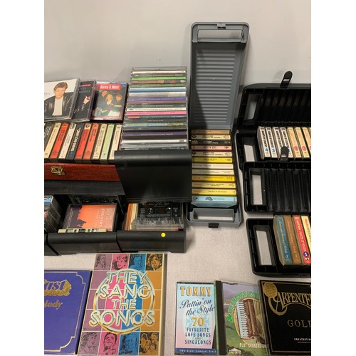 73 - Large collection of vintage music cassettes and cd's.