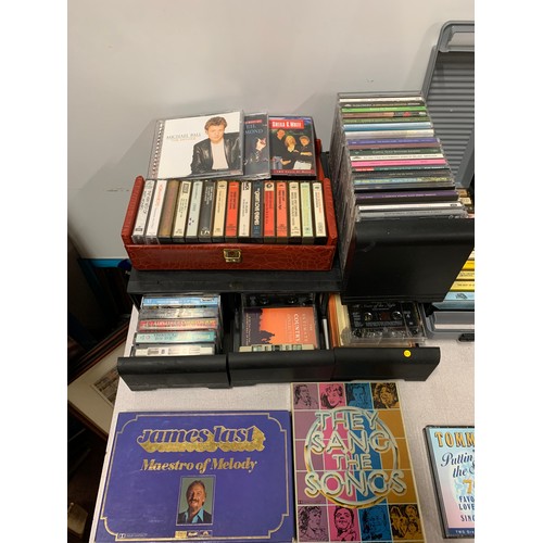 73 - Large collection of vintage music cassettes and cd's.