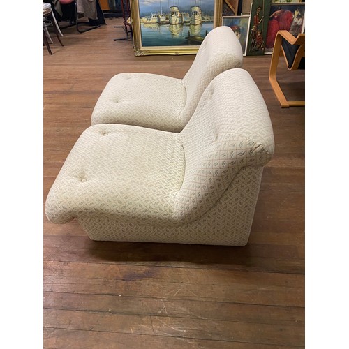 79 - Pair of vintage upholstered lounge chairs.