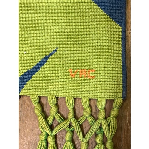 91 - Hand woven Brazilian wall hanging depicting palm leaves. Signed VRC.