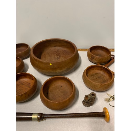 93 - Set of 7 Thai teak bowls along with carved wooden pipes etc.