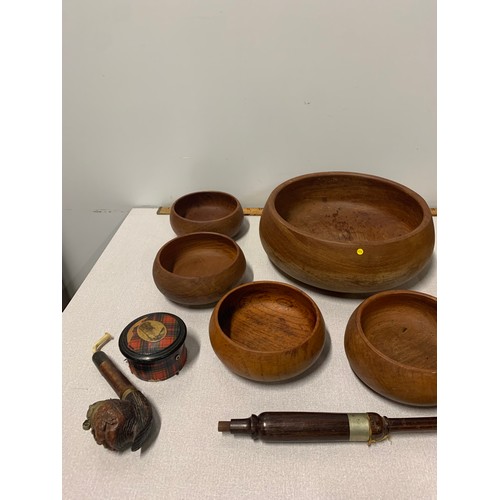 93 - Set of 7 Thai teak bowls along with carved wooden pipes etc.