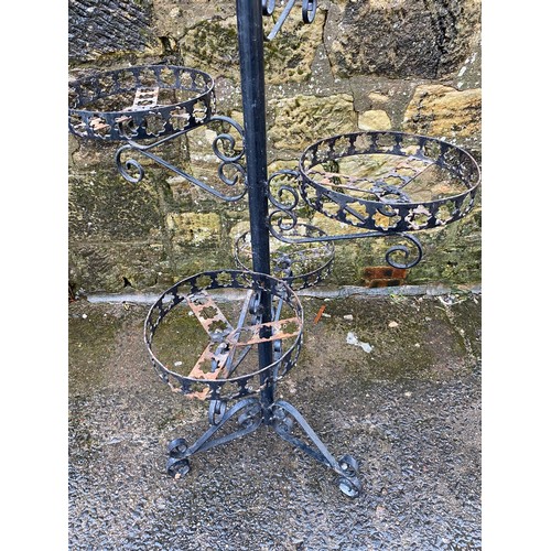 156 - Large ornate wrought iron garden flower basket holder with 8 basket holders.
Approx 188cm Tall