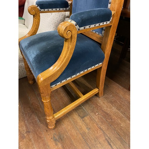 160 - Solid oak throne chair with blue velvet upholstery.