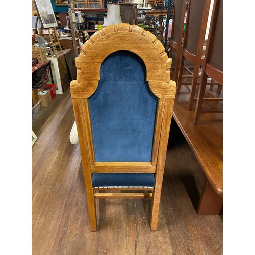 160 - Solid oak throne chair with blue velvet upholstery.