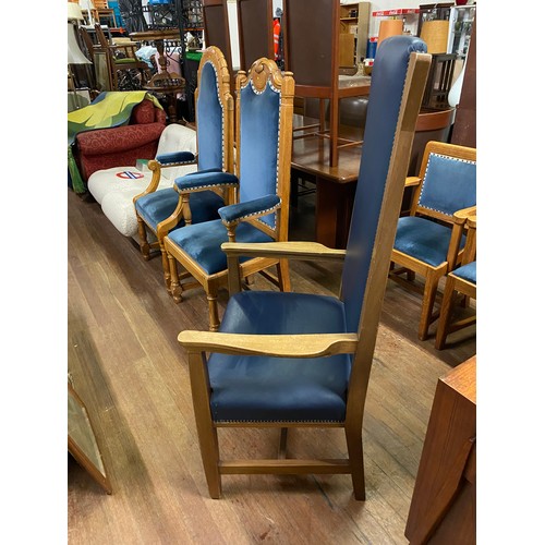 217 - Solid oak throne chair with blue leather upholstery.
141cm Tall