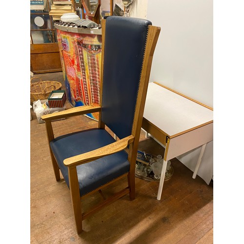 218 - Solid oak throne chair with blue leather upholstery.
141cm Tall