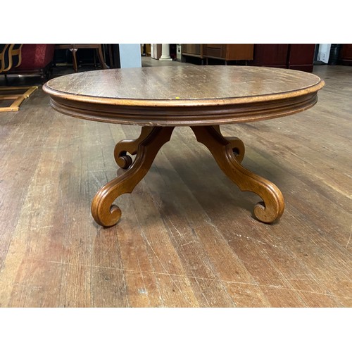 191 - Solid wood low set coffee table on curved legs.
90cm Diameter