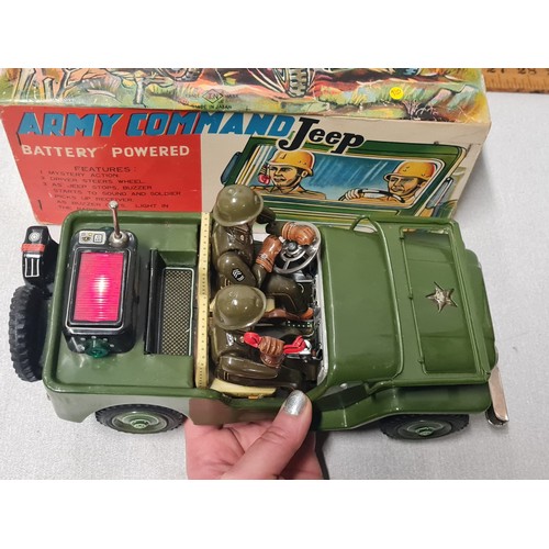 273 - 1960's tin plate Army Command battery operated jeep made by Nomura Japan. Has driver and phone opera... 