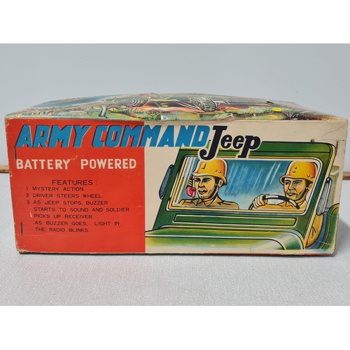 273 - 1960's tin plate Army Command battery operated jeep made by Nomura Japan. Has driver and phone opera... 