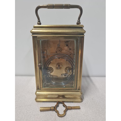 274 - Vintage heavy brass skeleton carriage clock with key.approx H 15cm X D 10cm