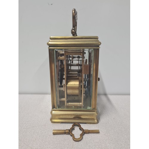 274 - Vintage heavy brass skeleton carriage clock with key.approx H 15cm X D 10cm