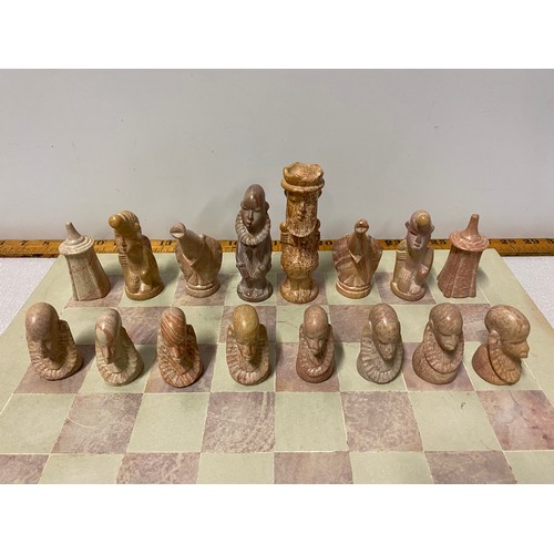 394 - large Carved soapstone chess set and board (damage to 1 piece)