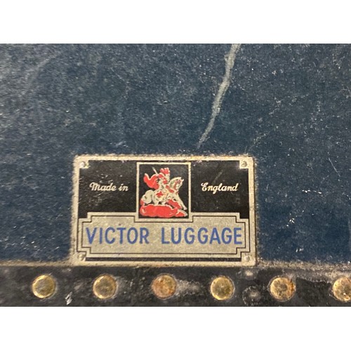 38 - Large vintage Victor Luggage travel trunk with insert and key.