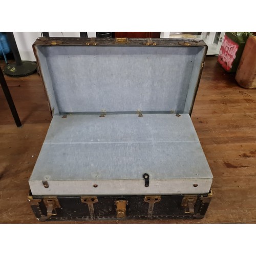 22 - Large vintage travel trunk with insert.