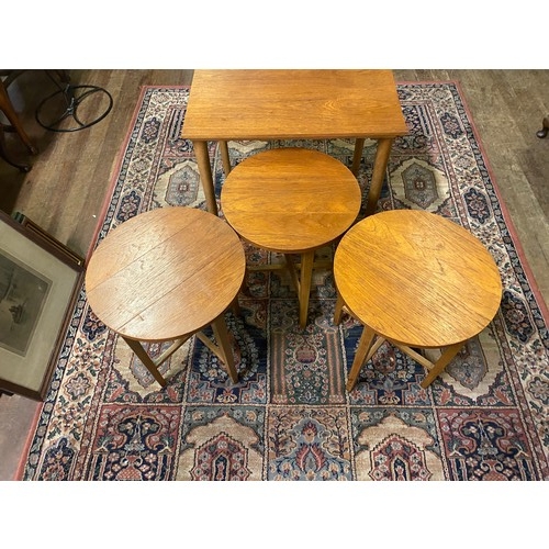 343 - mid century teak Danish style nest of tables.